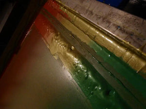 red gold and green metalic ink being blended on the printing press at glass siren studio